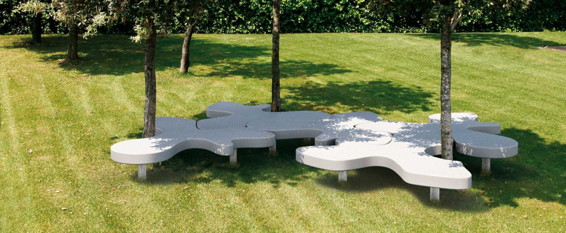 Banco monolitico NATURAL PUZZLE para parques y espacios públicos